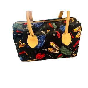 An original H. Ravi Dallas vintage golf print handbag purse retro golfer